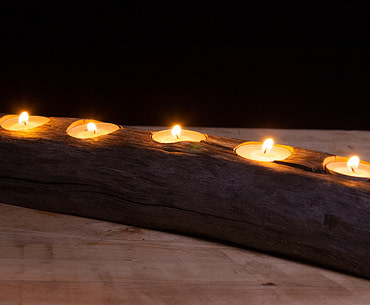 Candle holder made from apple wood