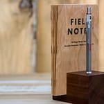 Walnut pencil and note book holder.