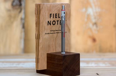 Walnut pencil and note book holder.