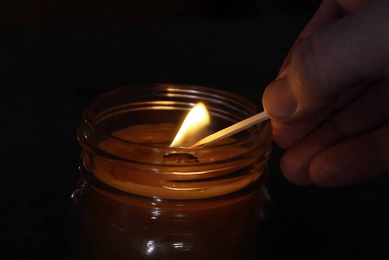 Bees Wax candle made with a wooden wick.